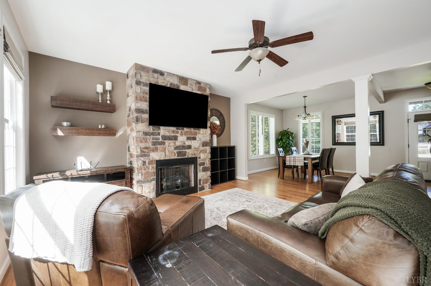 333 Sunset Ridge Drive Concord, VA 24538 - Photo 17 of 61 a living room with fireplace furniture and a flat screen tv