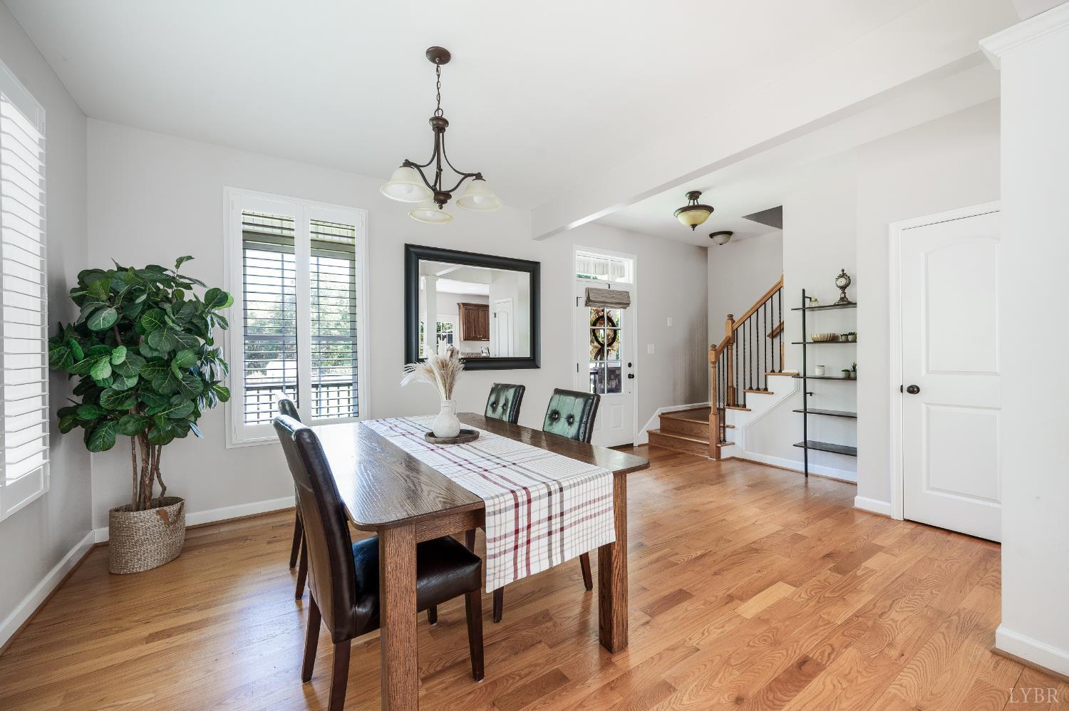 333 Sunset Ridge Drive Concord, VA 24538 - Photo 29 of 61 a view of a dining room with furniture window and wooden floor