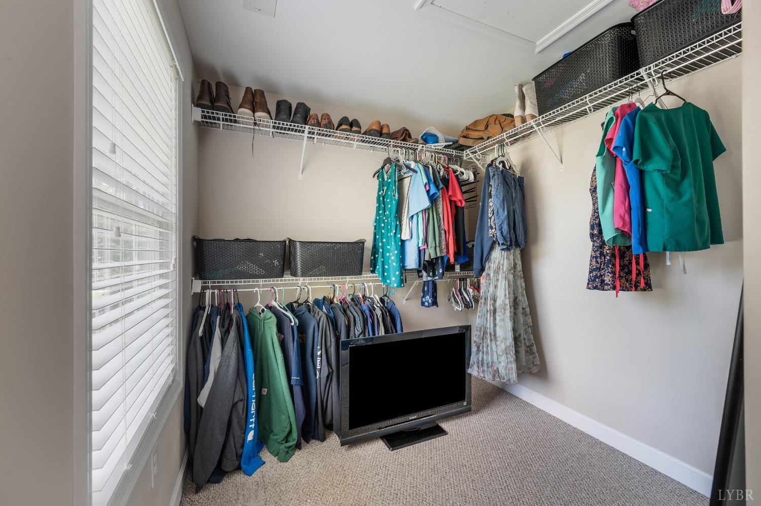 333 Sunset Ridge Drive Concord, VA 24538 - Photo 32 of 61 a view of walk in closet with clothes and shoes