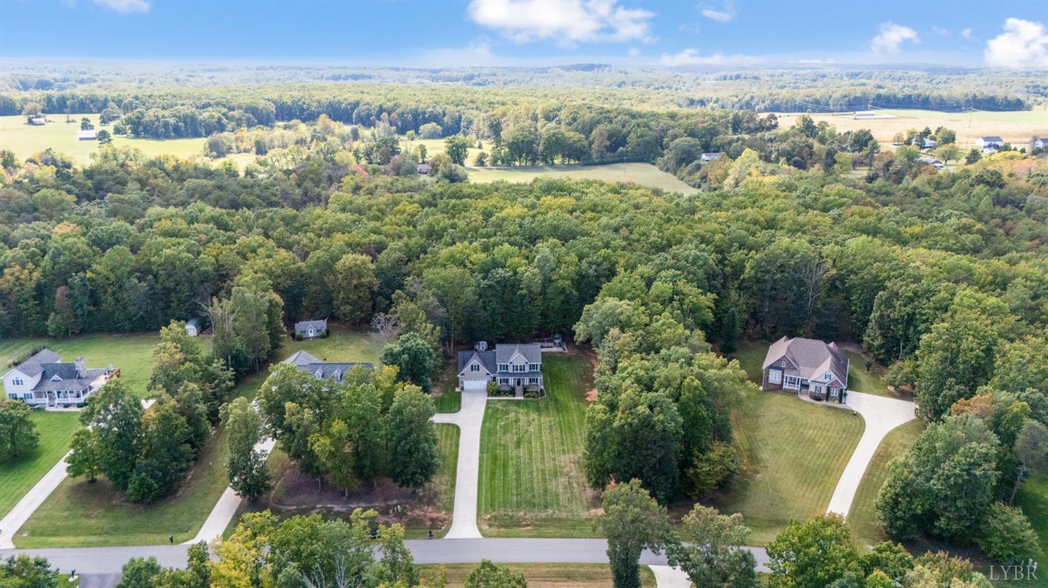 333 Sunset Ridge Drive Concord, VA 24538 - Photo 8 of 61 an aerial view of residential houses with outdoor space and trees