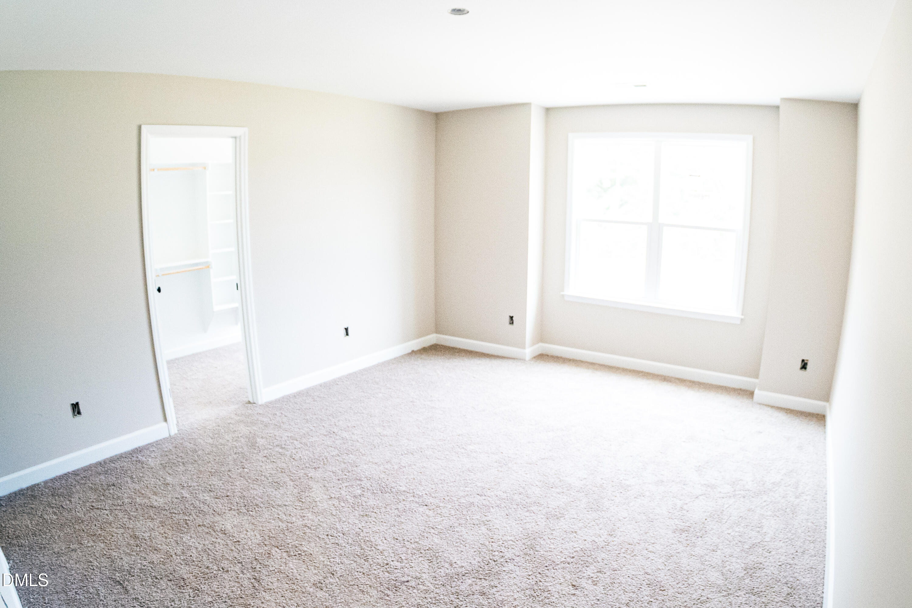 125 Wilson Street Erwin, NC 28339 - Photo 12 of 22 an empty room with a window