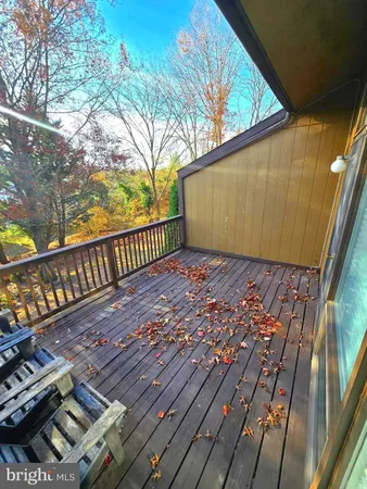 a view of a backyard with wooden floor