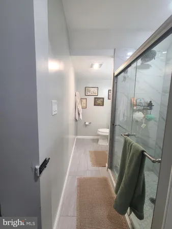 a view of hallway with mirror