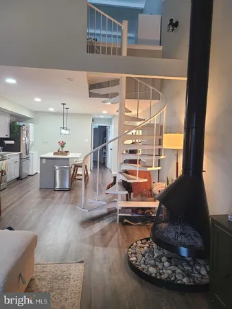 a living room with furniture and a table