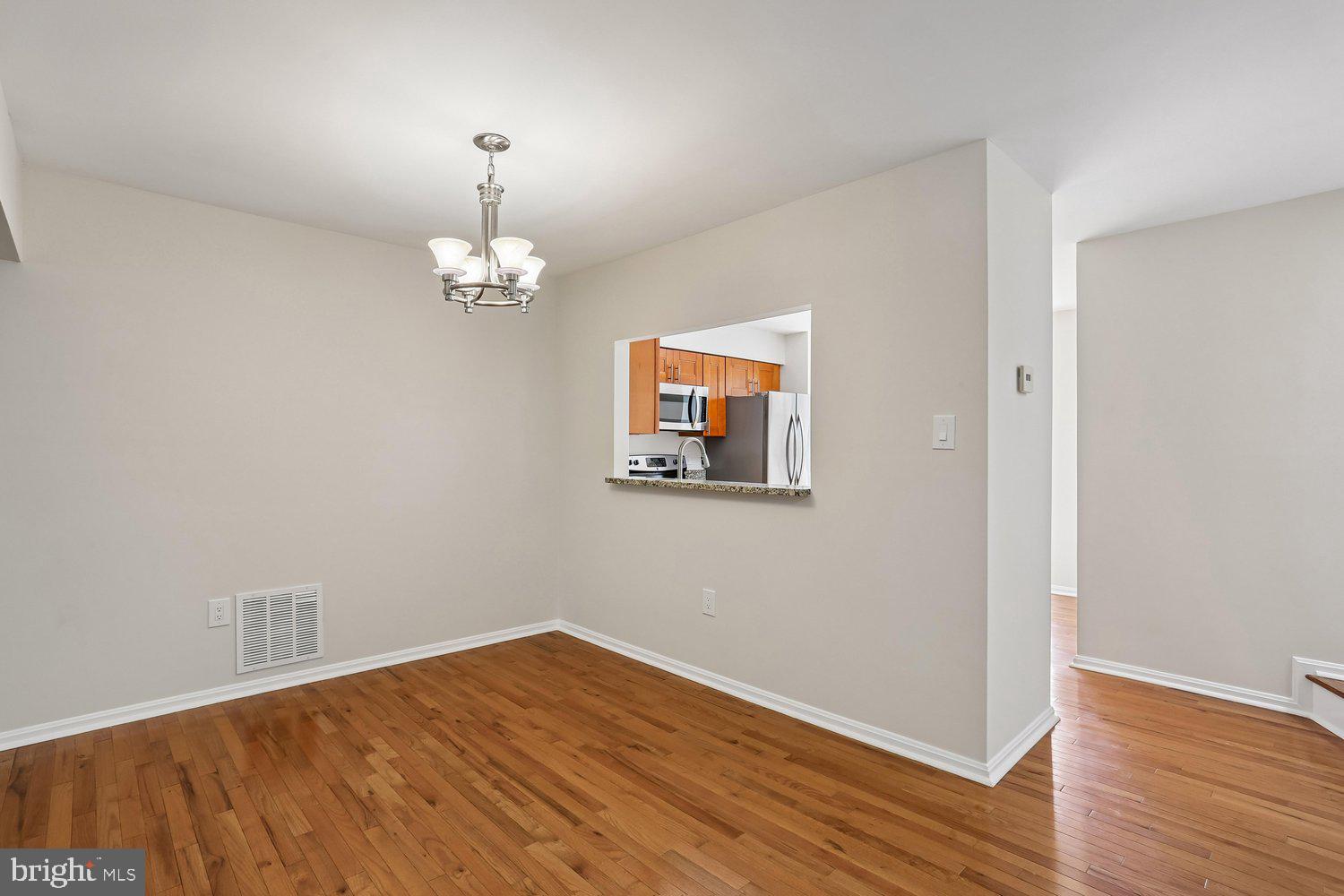 10804 Douglas Avenue Silver Spring, MD 20902 - Photo 12 of 46 Dining room with pass through from kitchen