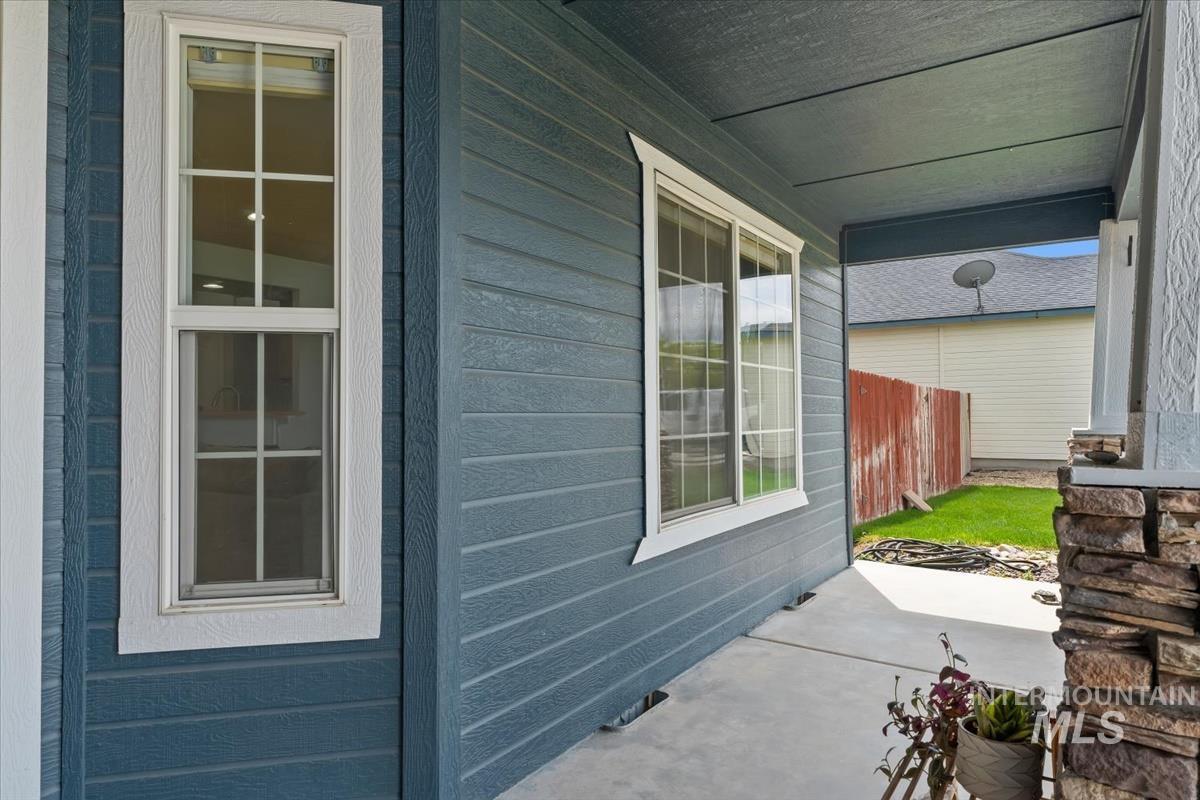 80 Cobblestone Court Middleton, ID 83644 - Photo 26 of 48 Front exterior featuring horizontal siding in a deep blue tone