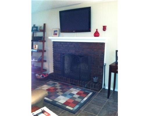 128 Parise Road Forest Hills, PA 15221 - Photo 6 of 11 Family Room. FAMILY ROOM WOOD BURNING FIREPLACE. CERAMIC STONE FLOOR. DECK IS OFF FAMILY ROOM.