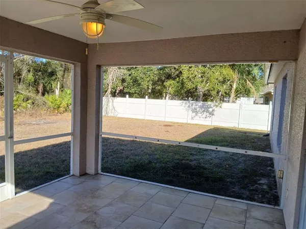 a view of a porch and garden