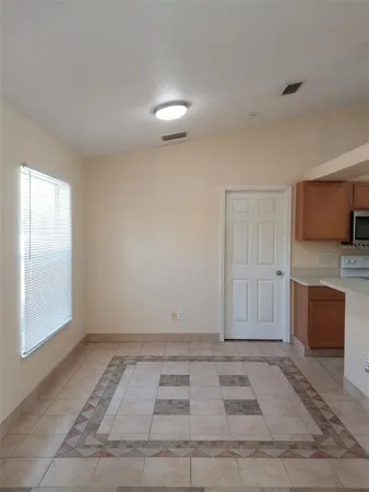 a view of livingroom with furniture and flat screen tv