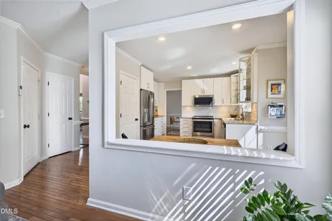 a bathroom with a granite countertop sink mirror and double