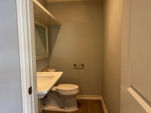 5375 County Road 73A, Unit 2 Robstown, TX 78380 - Photo 13 of 14 a bathroom with a toilet and a sink