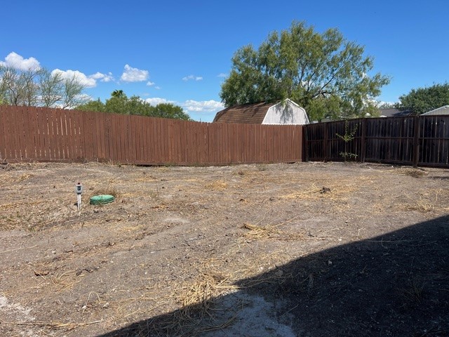 5375 County Road 73A, Unit 2 Robstown, TX 78380 - Photo 14 of 14 a backyard of house with wooden fence