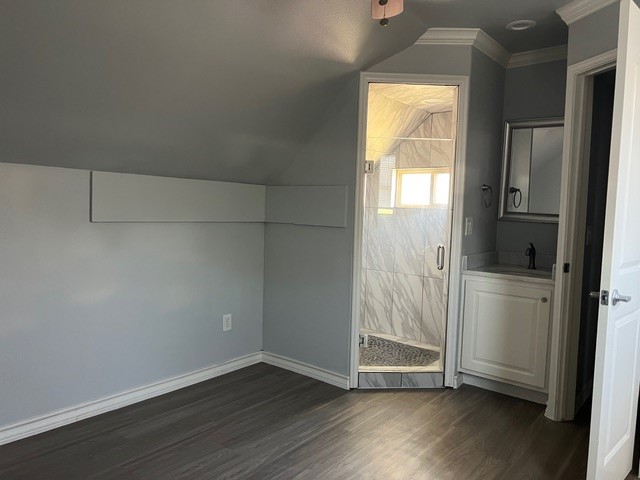 5375 County Road 73A, Unit 2 Robstown, TX 78380 - Photo 8 of 14 a view of an empty room with wooden floor and a window