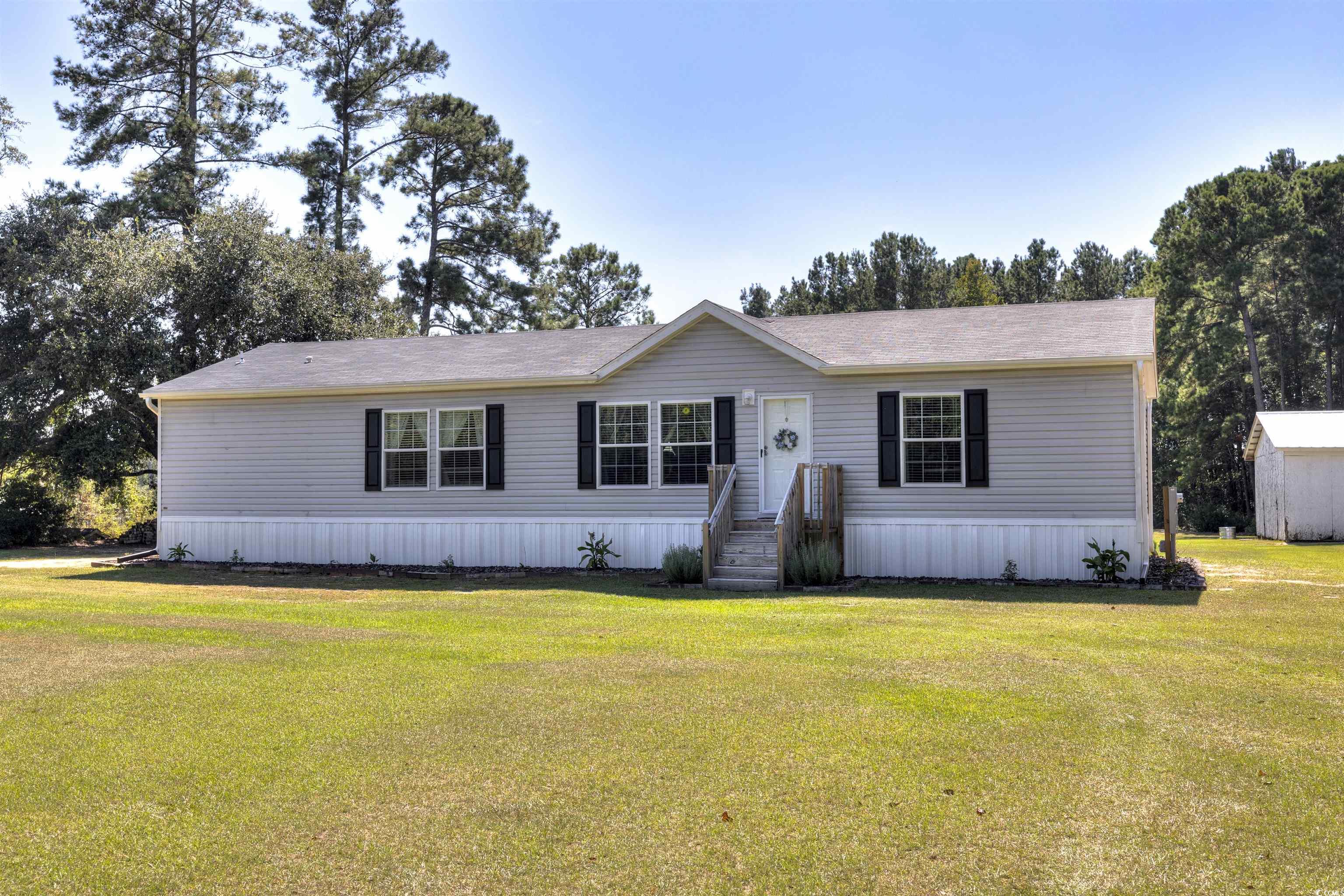 4520 Huggins Road Lake City, SC 29560 - Photo 1 of 40 Manufactured / mobile home with a front yard