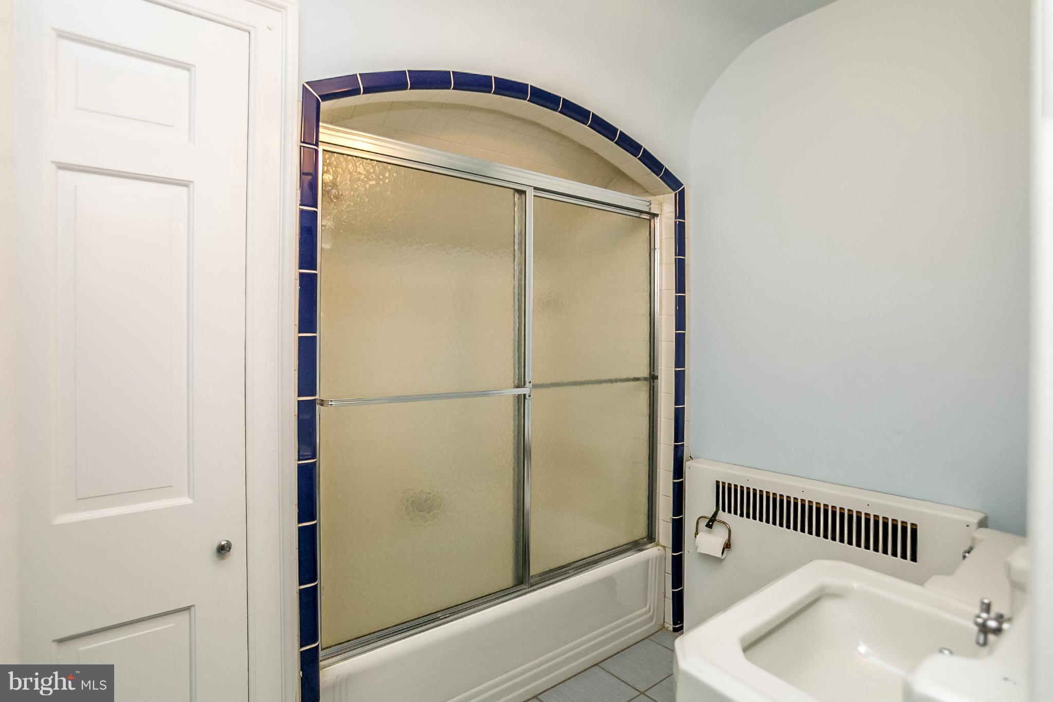1500 Dunlora Road Baltimore, MD 21204 - Photo 20 of 30 Upper Level Bath with Arched Tile Shower