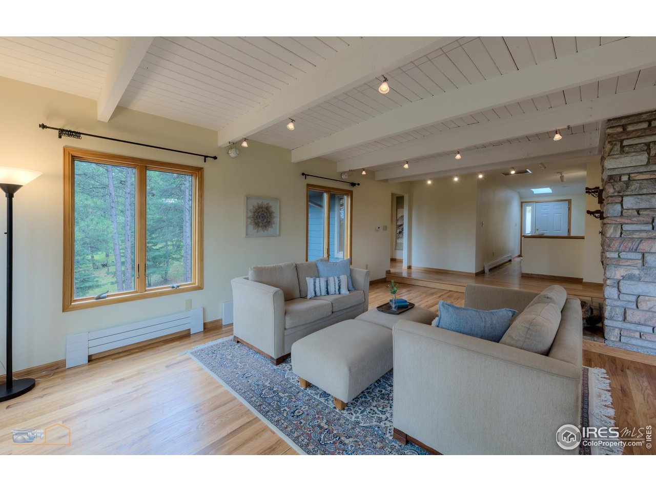 335 Pine Tree Lane Boulder, CO 80304 - Photo 6 of 46 Spacious living room with beautiful wood floors