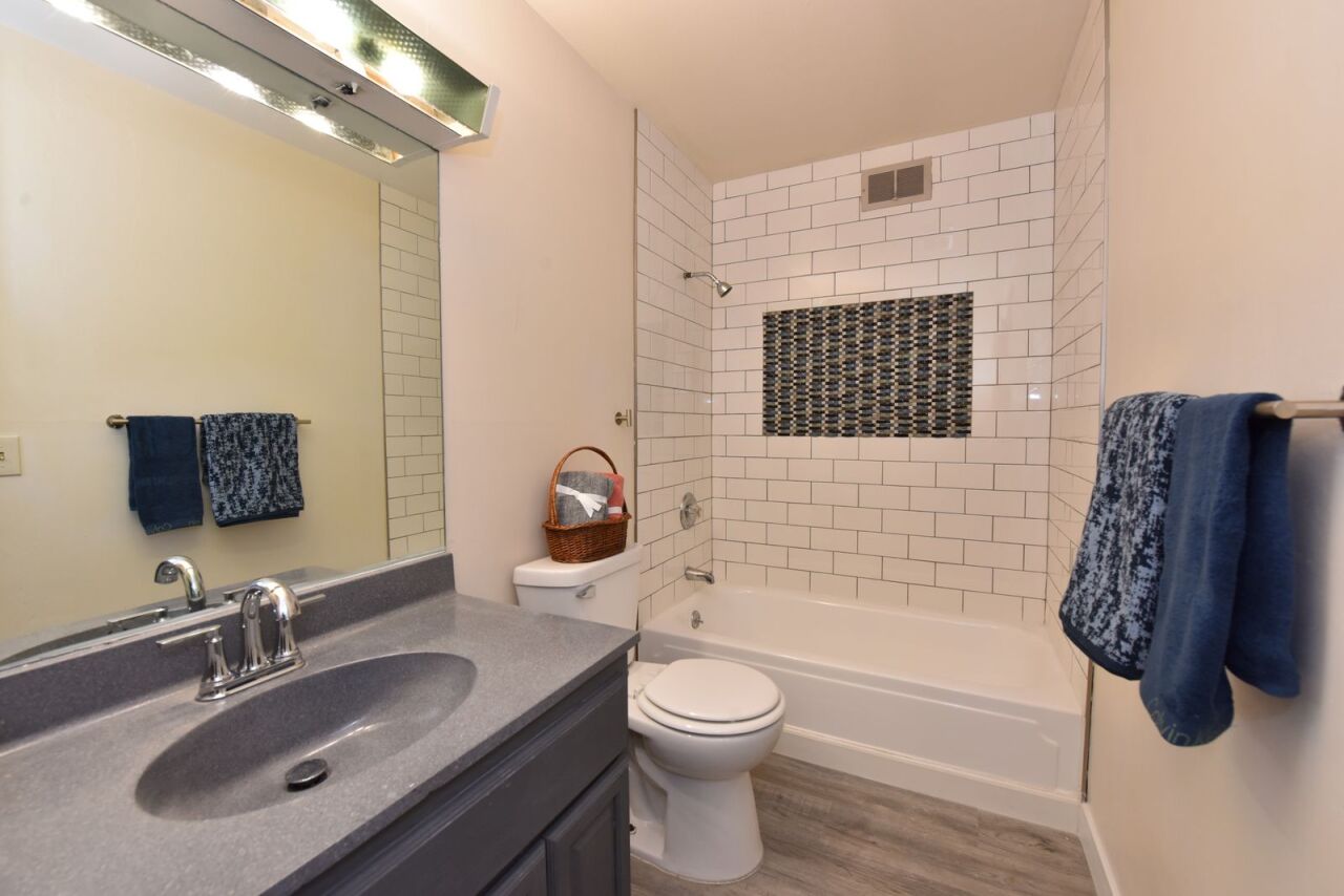 6081 West Calumet Road Milwaukee, WI 53223 - Photo 23 of 29 Main Bath with New Tile