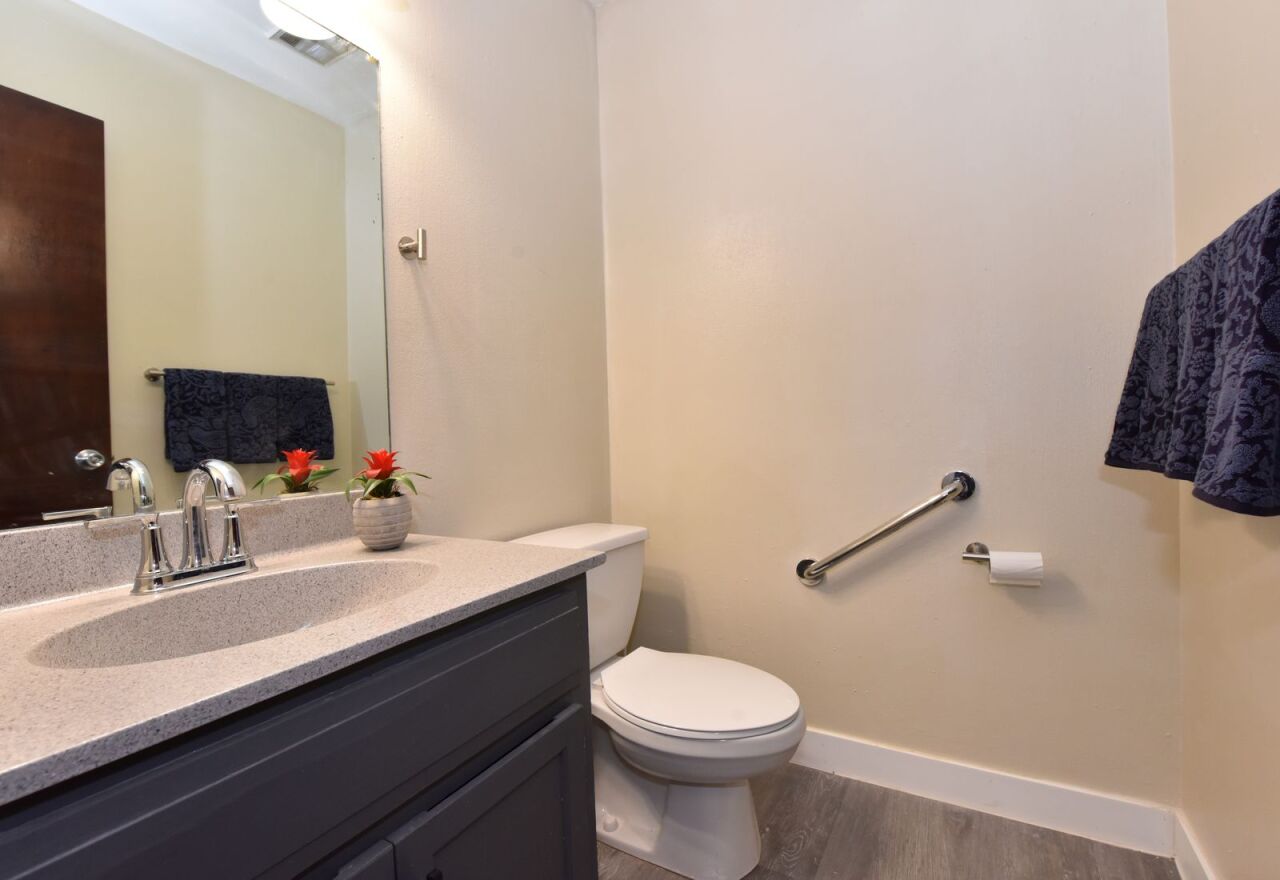 6081 West Calumet Road Milwaukee, WI 53223 - Photo 24 of 29 Powder Room with New Flooring