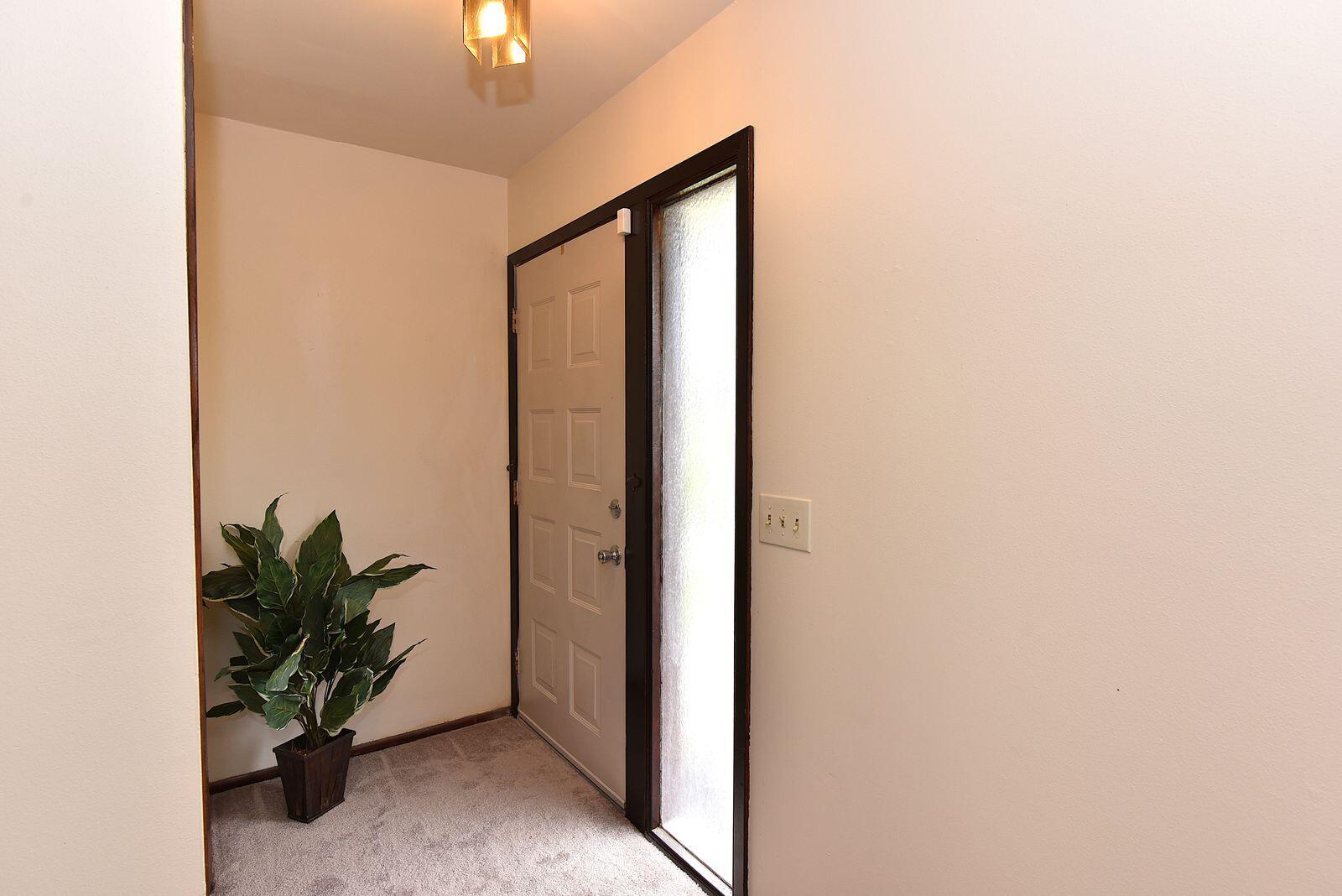 6081 West Calumet Road Milwaukee, WI 53223 - Photo 28 of 29 Front Door