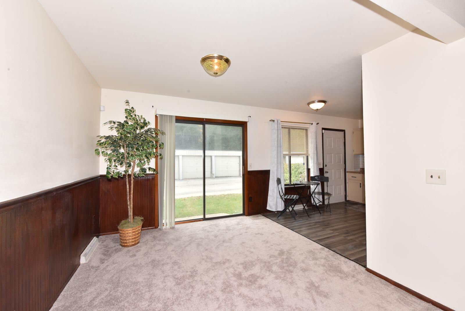 6081 West Calumet Road Milwaukee, WI 53223 - Photo 6 of 29 Dining Room Overlooking Patio