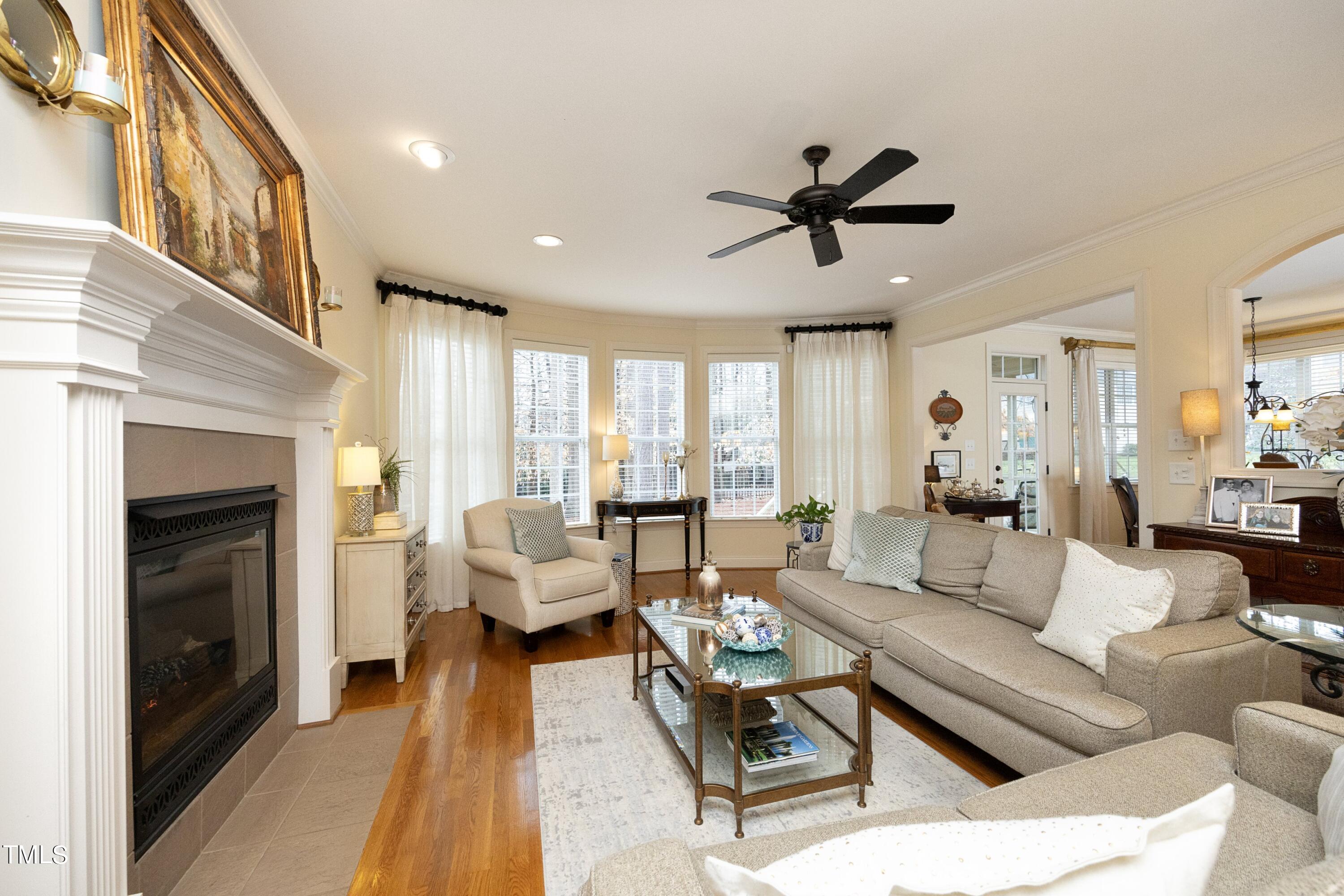 11514 Autumn Oaks Lane Raleigh, NC 27614 - Photo 11 of 39 a living room with furniture and a fireplace
