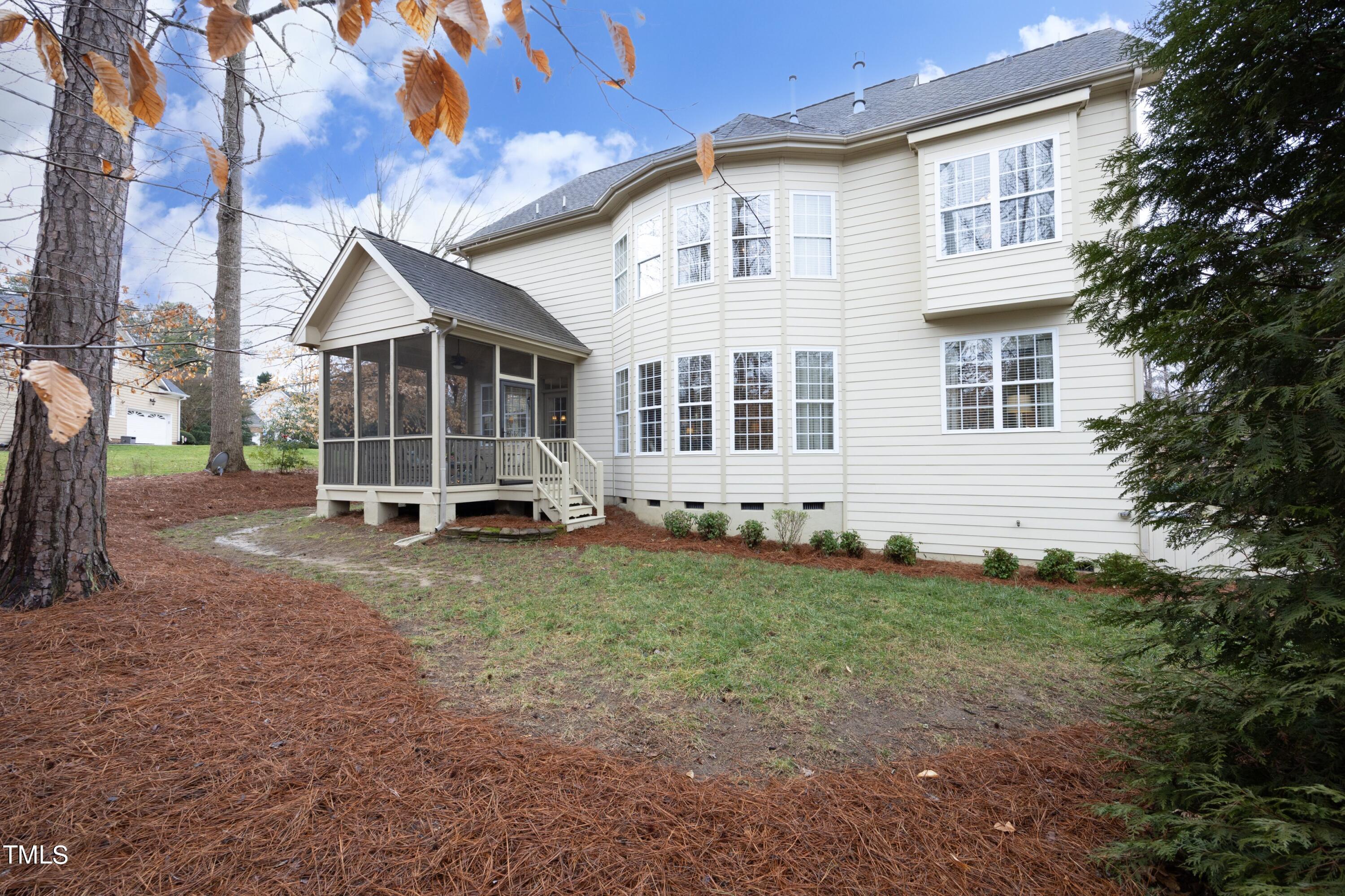 11514 Autumn Oaks Lane Raleigh, NC 27614 - Photo 38 of 39 a view of a house with backyard and garden