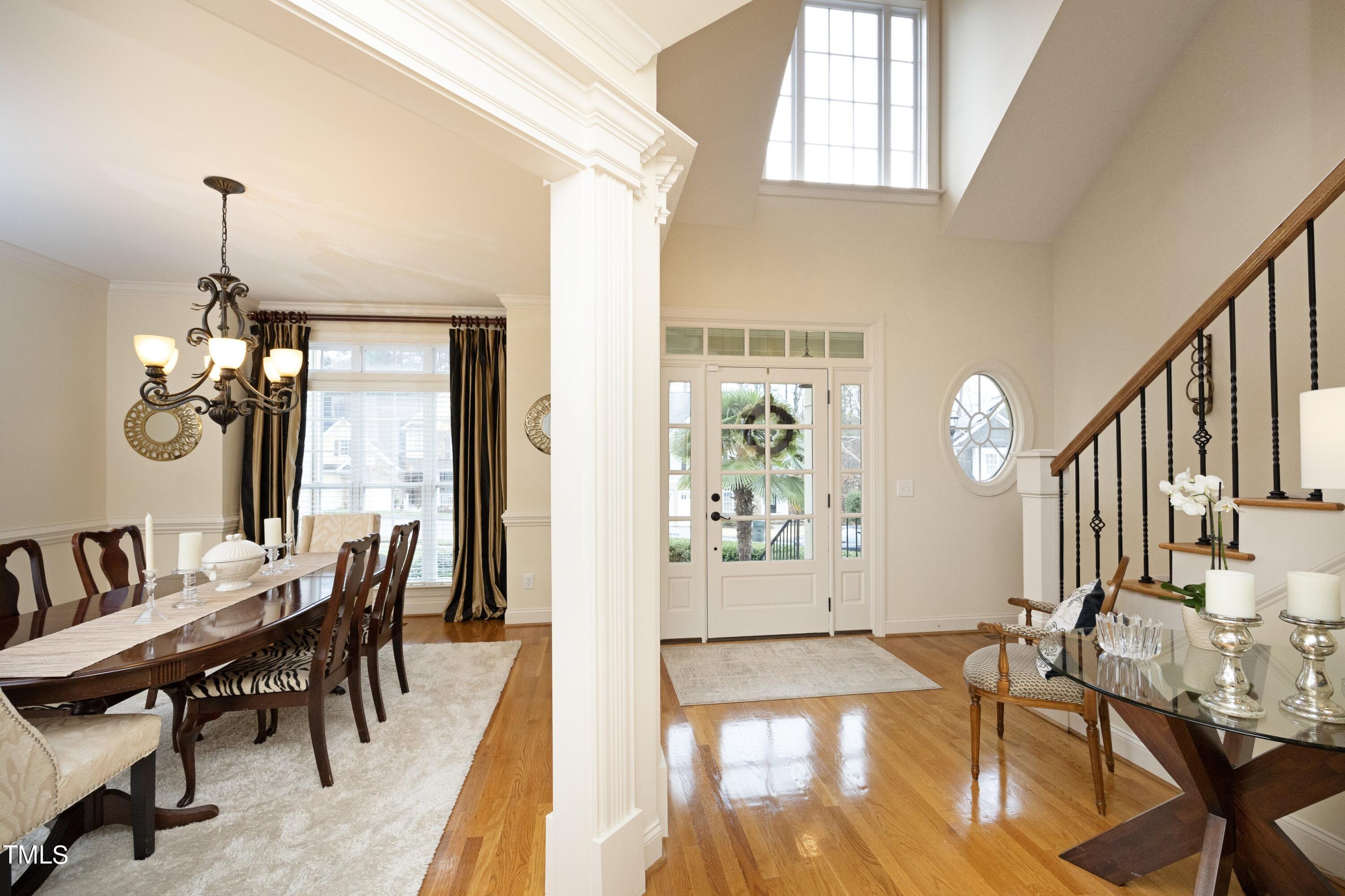 11514 Autumn Oaks Lane Raleigh, NC 27614 - Photo 9 of 39 a view of a livingroom with furniture window and wooden floor