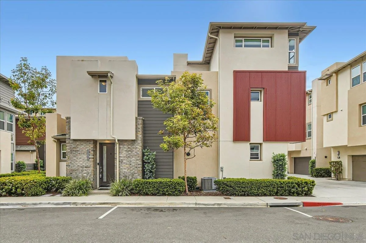 2290 Element Way Chula Vista, CA 91915 - Photo 2 of 34 a front view of a house with a yard