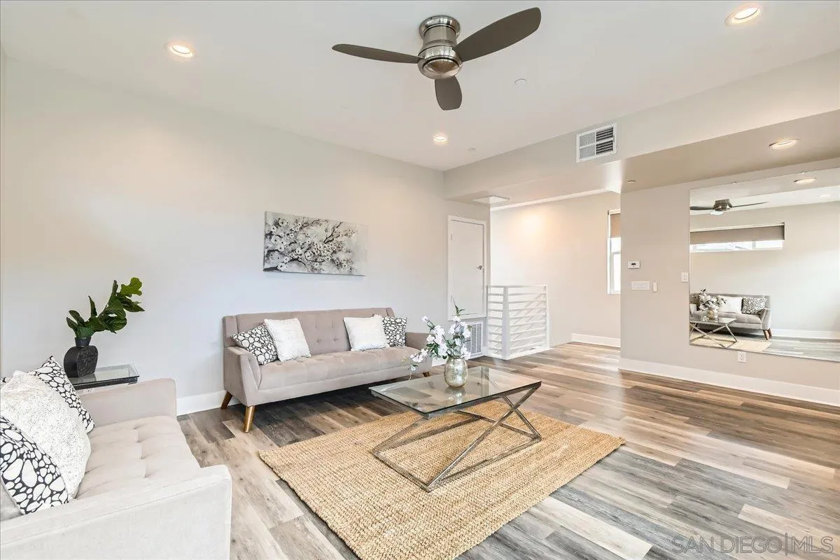 2290 Element Way Chula Vista, CA 91915 - Photo 21 of 34 a living room with furniture and a chandelier