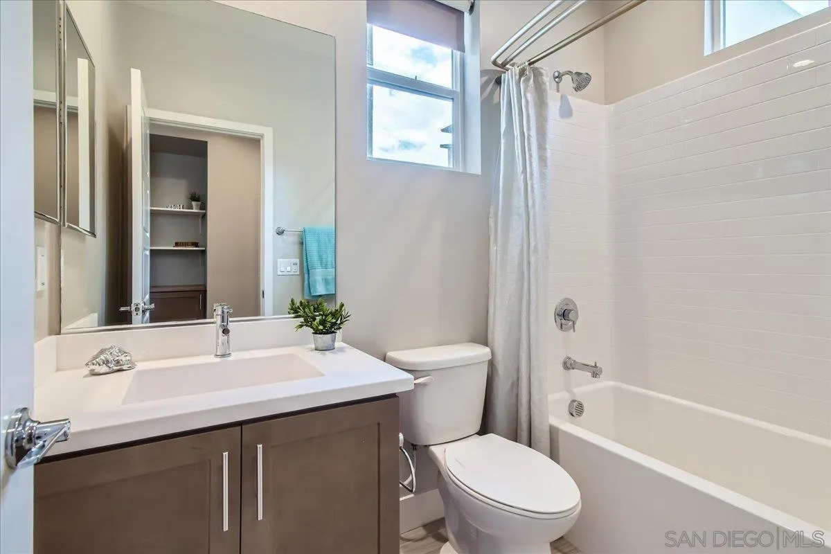 2290 Element Way Chula Vista, CA 91915 - Photo 24 of 34 a bathroom with a sink a toilet and shower