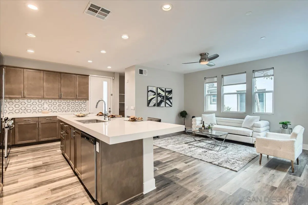 2290 Element Way Chula Vista, CA 91915 - Photo 6 of 34 a large white kitchen with a large window