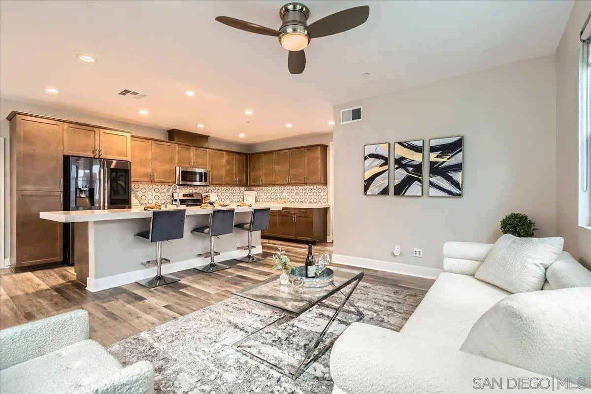 2290 Element Way Chula Vista, CA 91915 - Photo 9 of 34 a living room with furniture and kitchen view