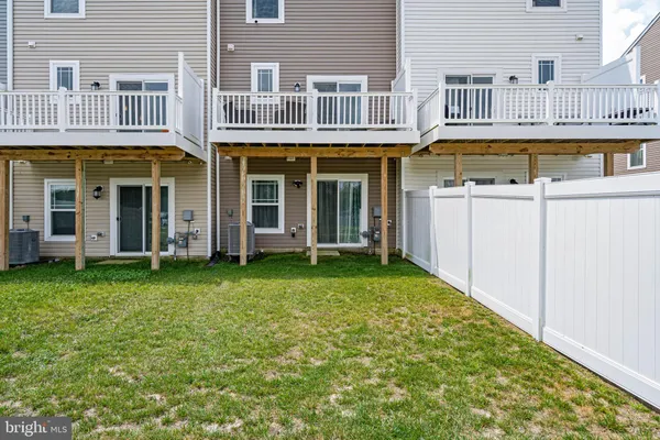 front view of a building with a yard