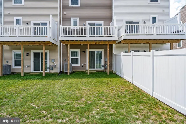 front view of a building with a yard