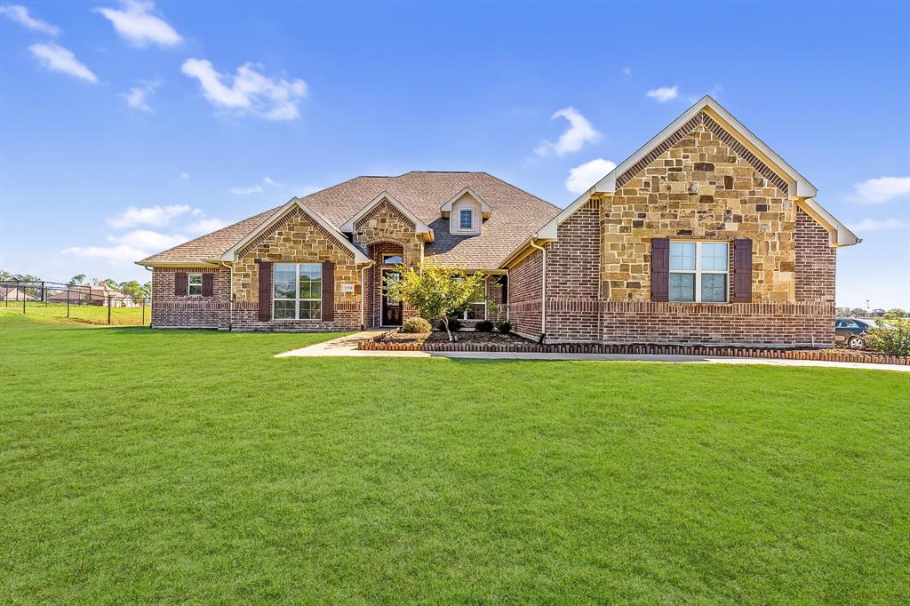 159 Eagles Crest Lane Weatherford, TX 76087 - Photo 1 of 1 a front view of a house with garden