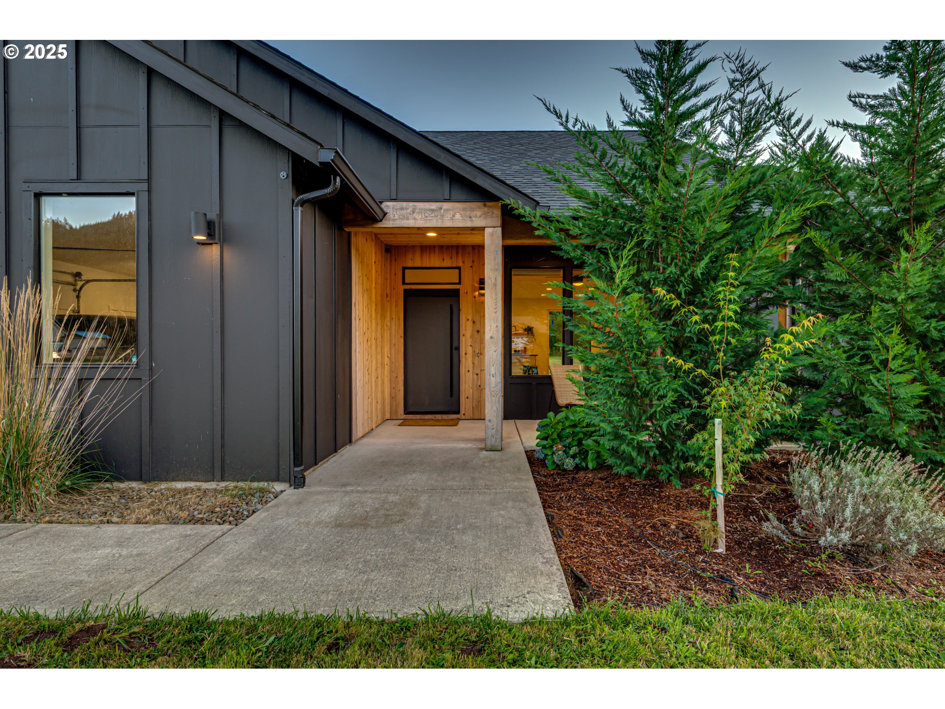 192 Stuart Field Lane Ariel, WA 98603 - Photo 2 of 35 a view of a house with a yard