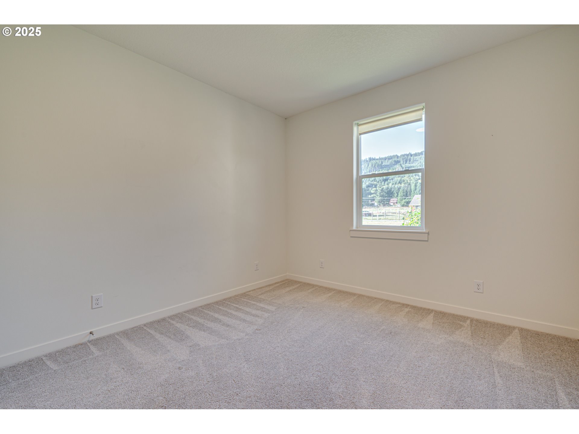 192 Stuart Field Lane Ariel, WA 98603 - Photo 21 of 35 an empty room with a window
