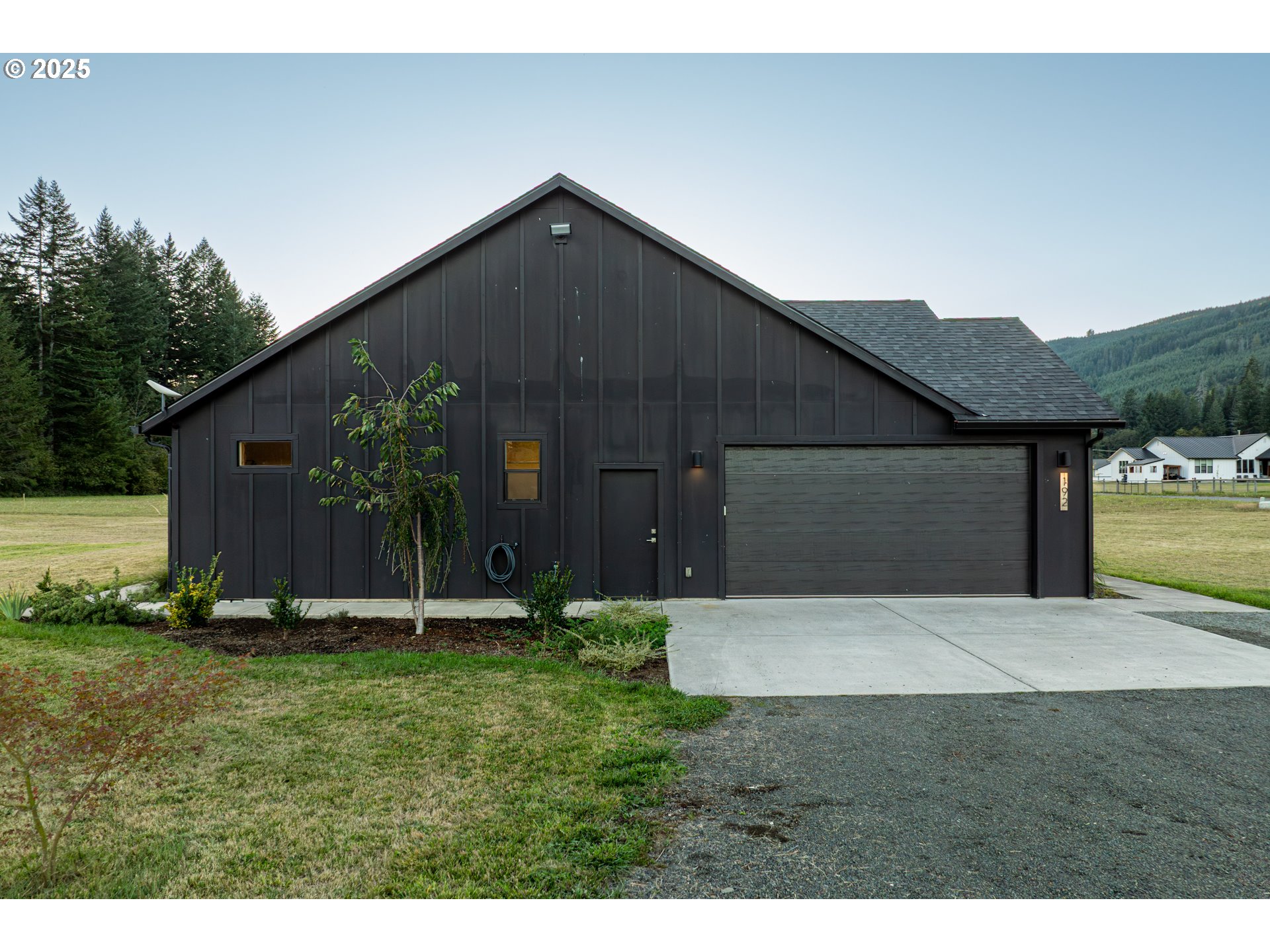 192 Stuart Field Lane Ariel, WA 98603 - Photo 29 of 35 a front view of a house with garden