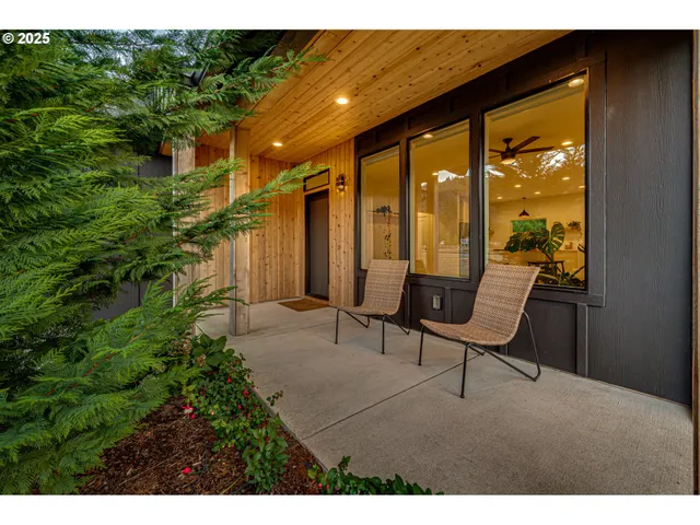 a view of an chairs and tables in the patio