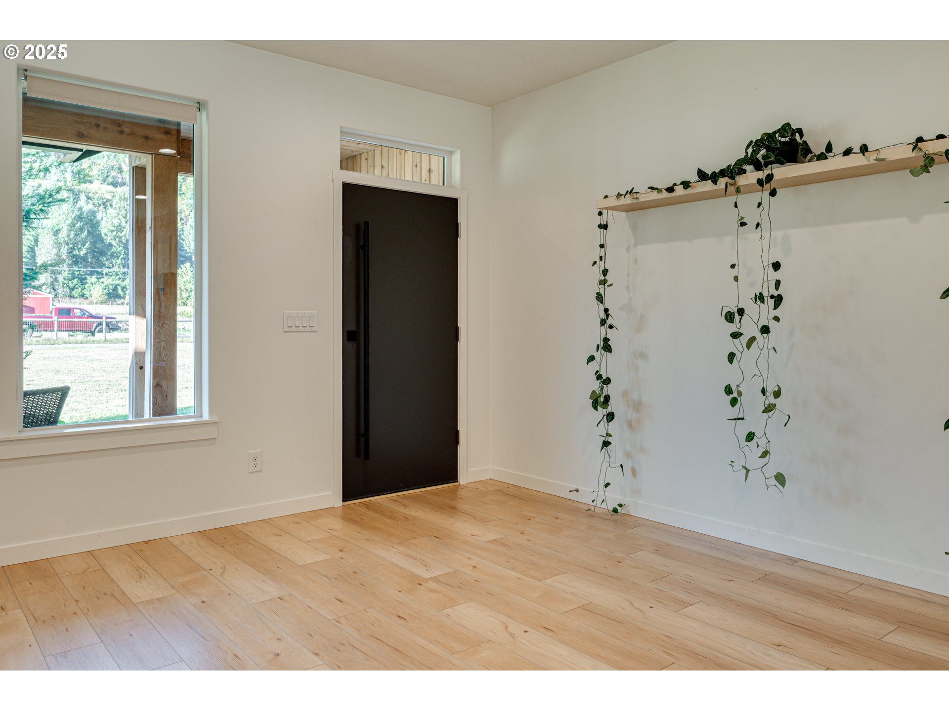 192 Stuart Field Lane Ariel, WA 98603 - Photo 9 of 35 a view of an empty room with a window
