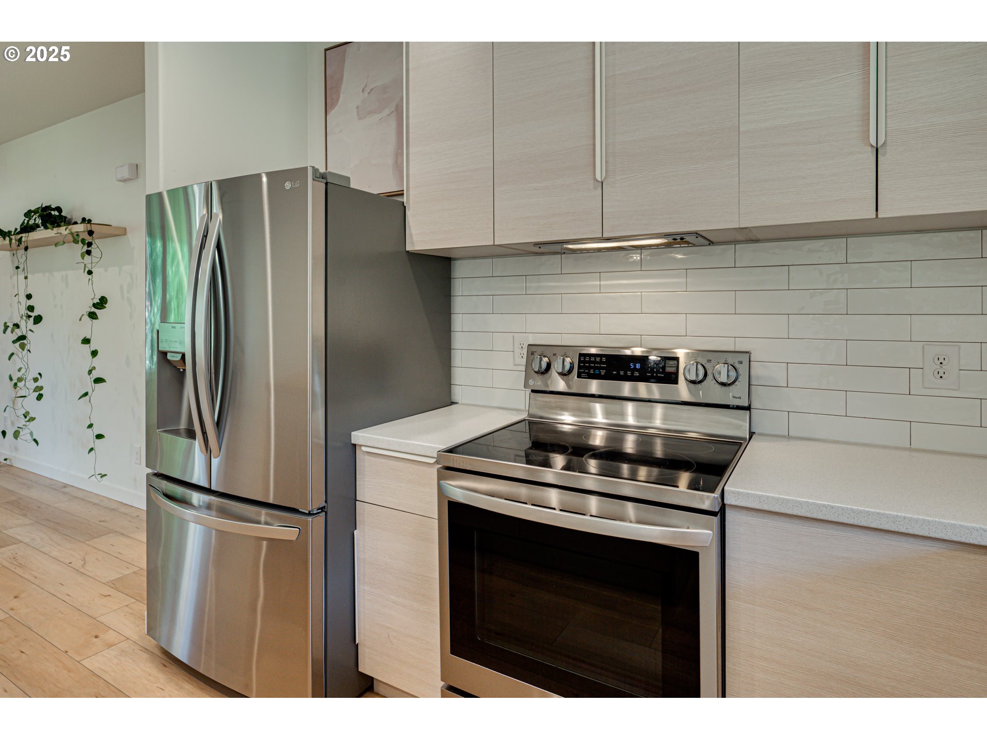 192 Stuart Field Lane Ariel, WA 98603 - Photo 10 of 35 a kitchen with cabinets and stainless steel appliances