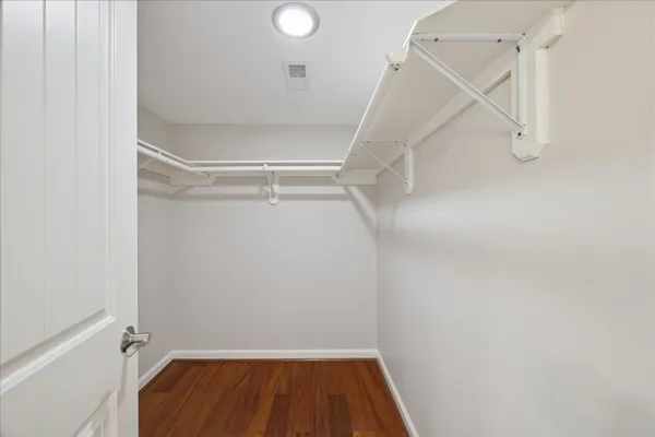 a view of storage and utility room with racks on the wall