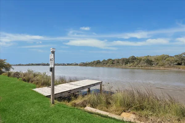 a view of a lake from a yard