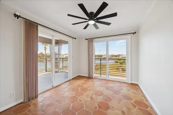 a view of an empty room with a window