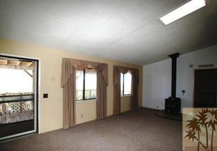 59350 Rocky Ravine Road Anza, CA 92539 - Photo 3 of 15 an empty room with windows