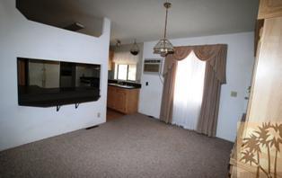 59350 Rocky Ravine Road Anza, CA 92539 - Photo 7 of 15 a view of a living room with furniture and a flat screen tv