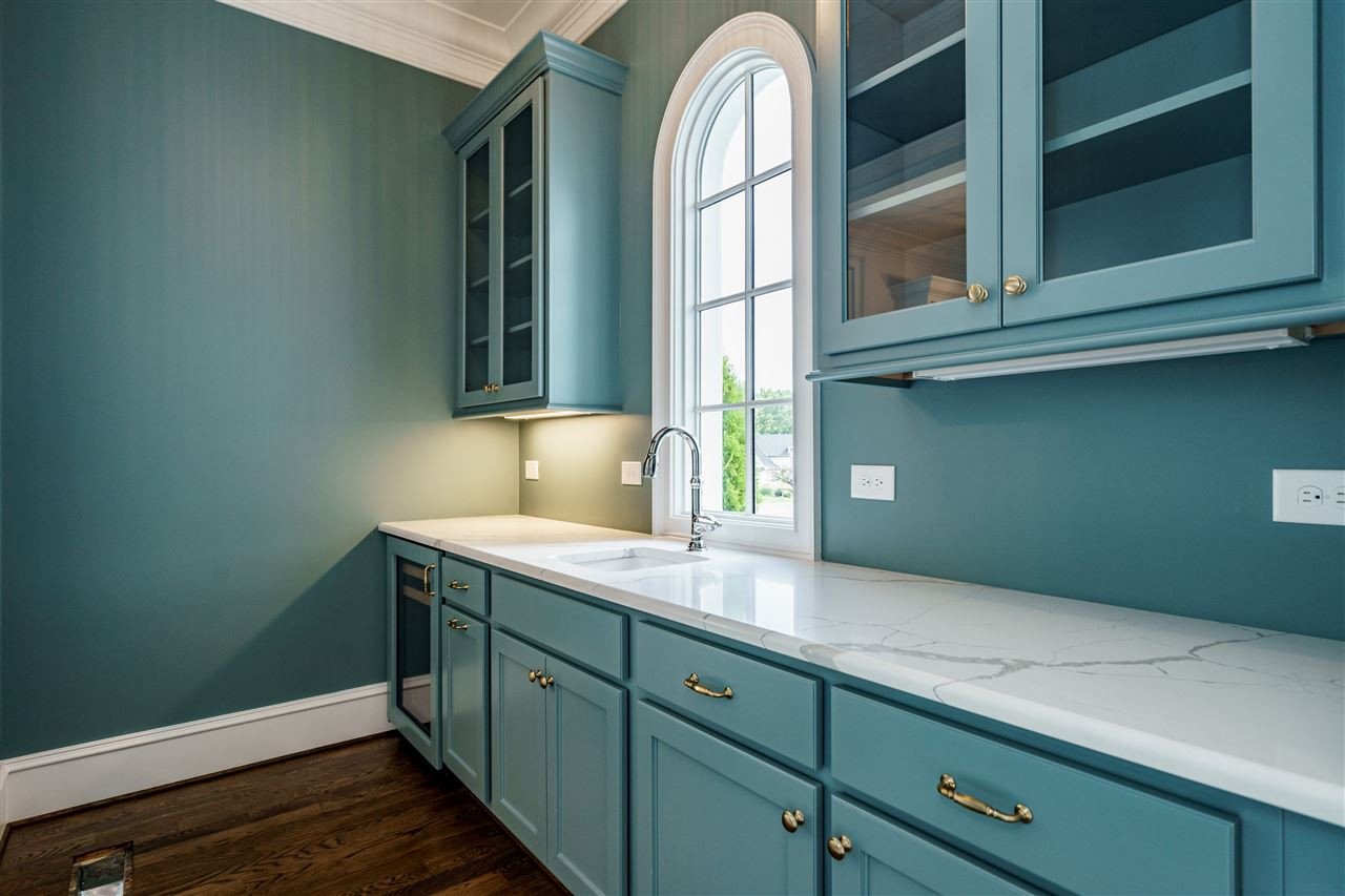 6505 Century Oak Court Raleigh, NC 27613 - Photo 7 of 30 Butler's Pantry with Abundant Cabinetry