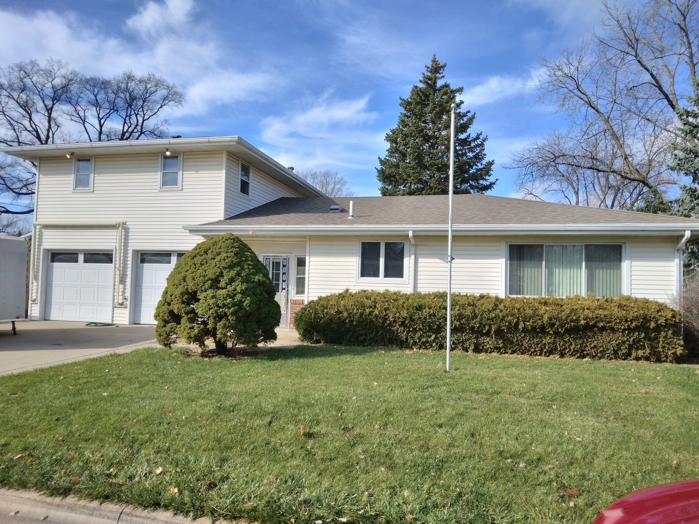 a view of a house with a yard