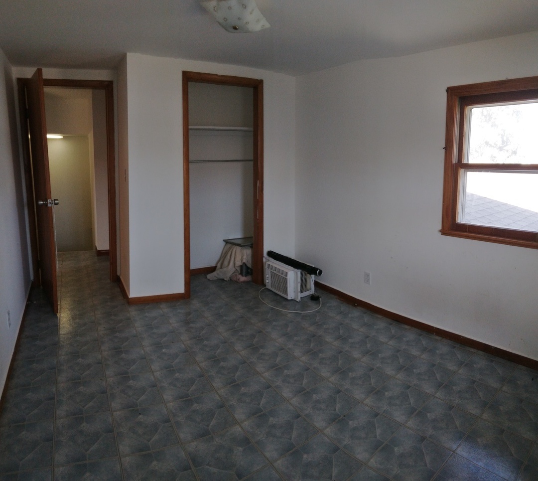 2201 Root Street Crest Hill, IL 60403 - Photo 17 of 27 an empty room with closet