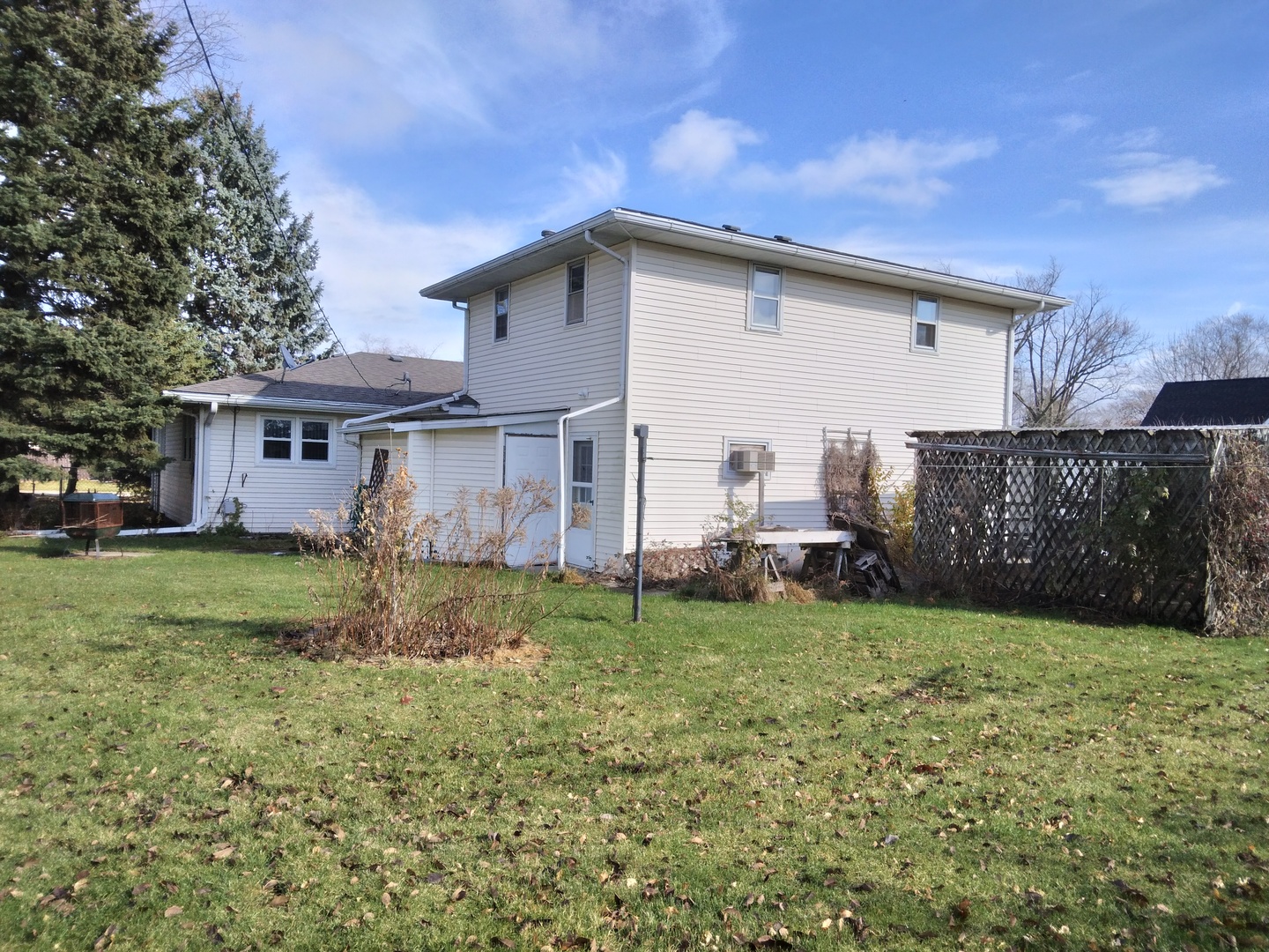 2201 Root Street Crest Hill, IL 60403 - Photo 27 of 27 a view of a house with a yard and lawn chairs